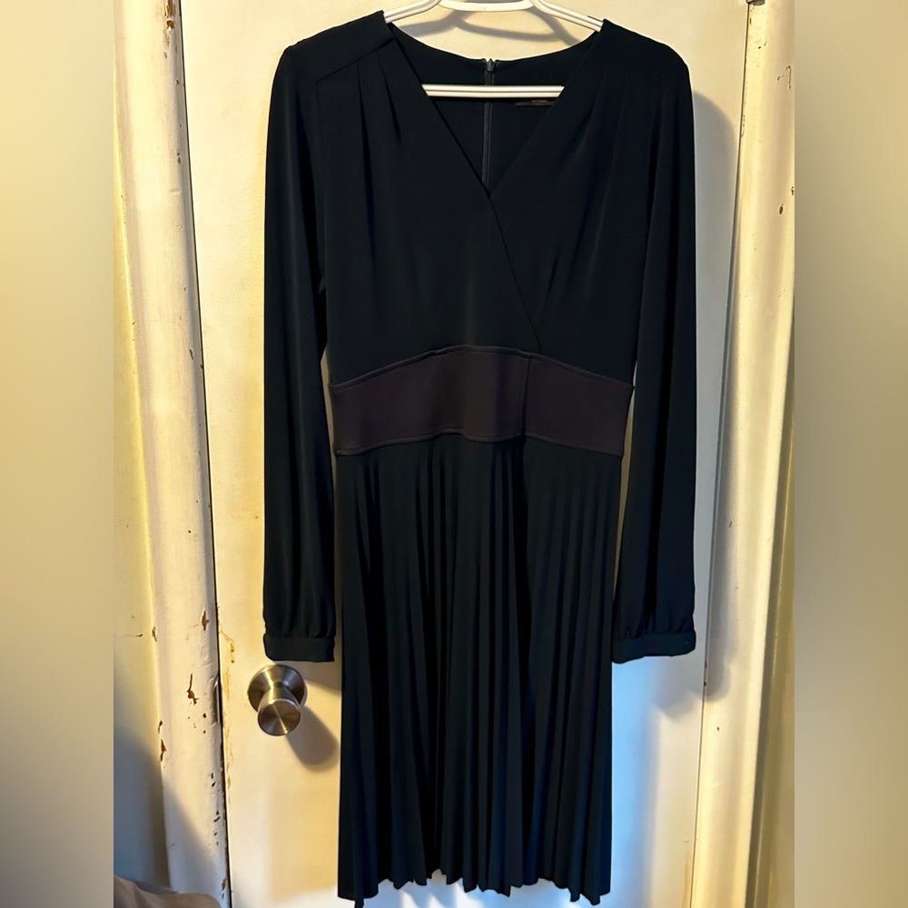 Iris - Navy midi dress. Pleated skirt, defined waist line cross over v-neck.